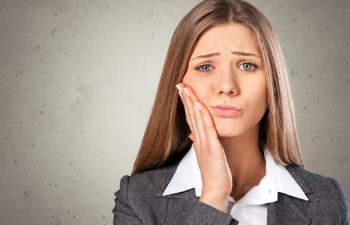 young woman with toothache